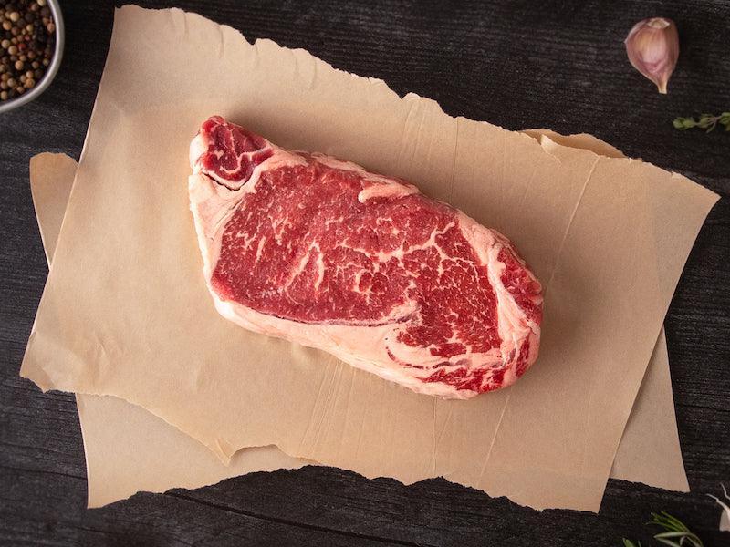Kurobuta Pork Tomahawk Steak -14oz – Holy Grail Steak Co.